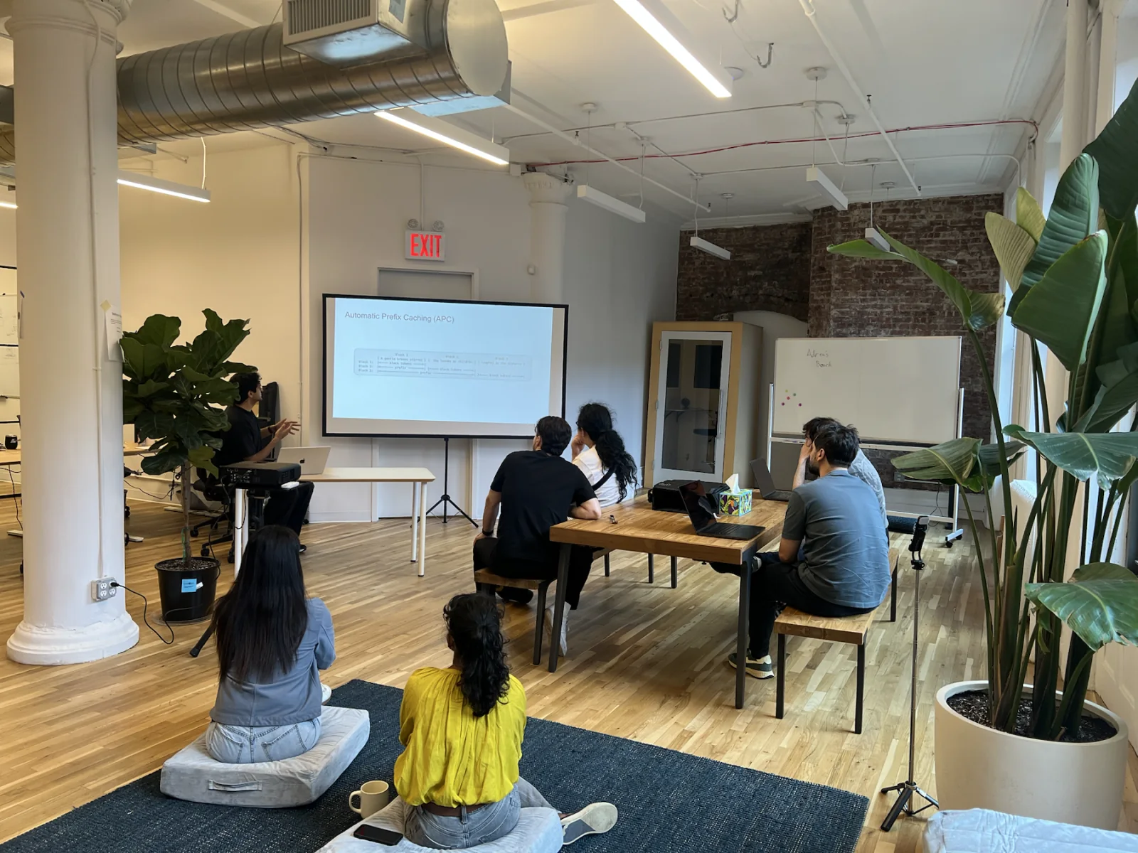 LM Studio team members in an office technical discussion